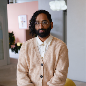 A photograph shows a portrait of Imran Siddiquee.