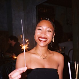 An image shows a portrait of Shaakira DeLoatch.