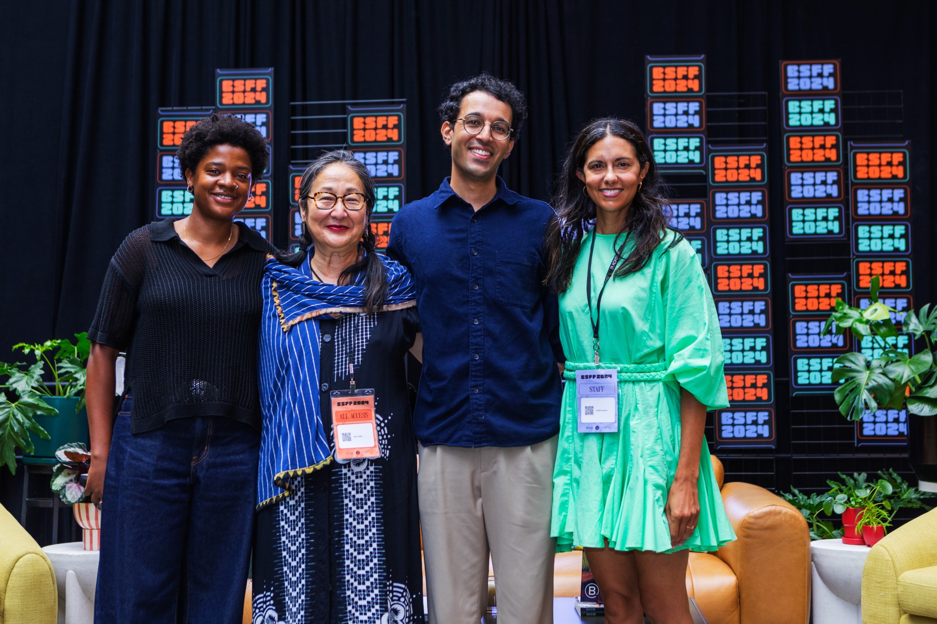 A photo of four people standing on the Daily Jawn Stage at the 2024 BlackStar Film Festival.