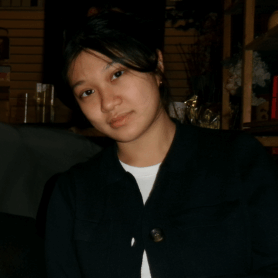 A headshot of Chloe To. She is a young Asian woman.