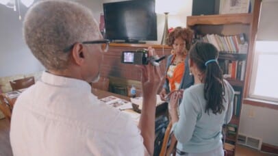Mike and Debbie interview a subject of their film, Dana Lomax.