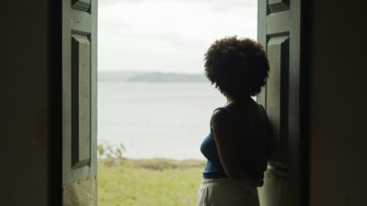 Still from a scene in the movie in which the director is looking at the Paraguassu River.