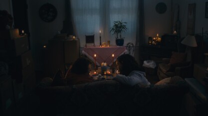 Laila (Rand Faris) and Teta (Amineh Elsherif) on the couch.