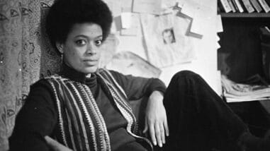 Photo of Toni Cade Bambara from 1970 taken in her home in Harlem. The photographer is LeRoy Henderson.