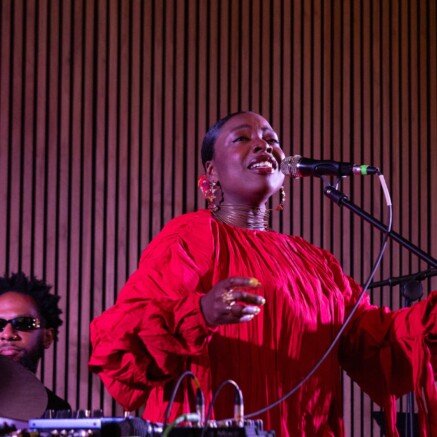 Melanie Charles performs a song at the 2024 BlackStar Luminary Gala.