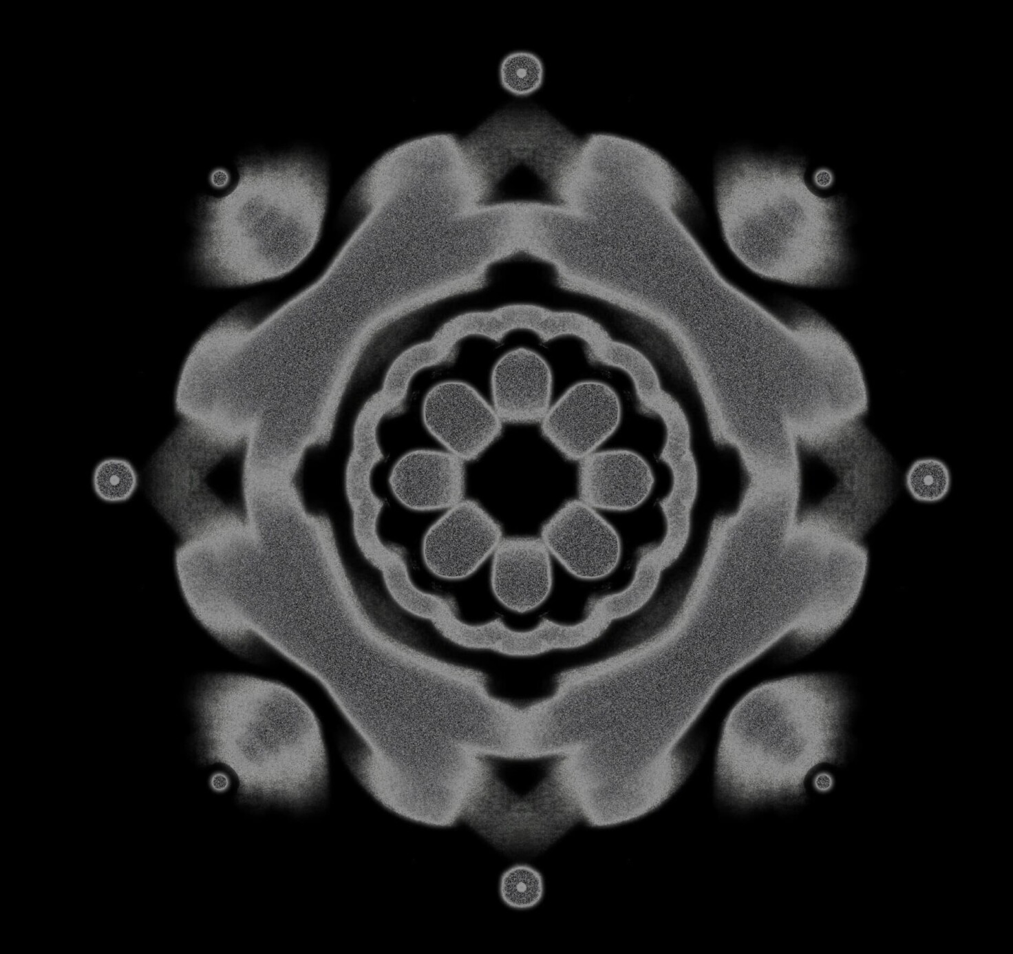 Abstract grey patterns creating a circular shape with a grey flower inside.