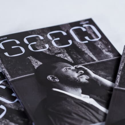 A photo of a several copies of Seen issue 009 laid out on a table.