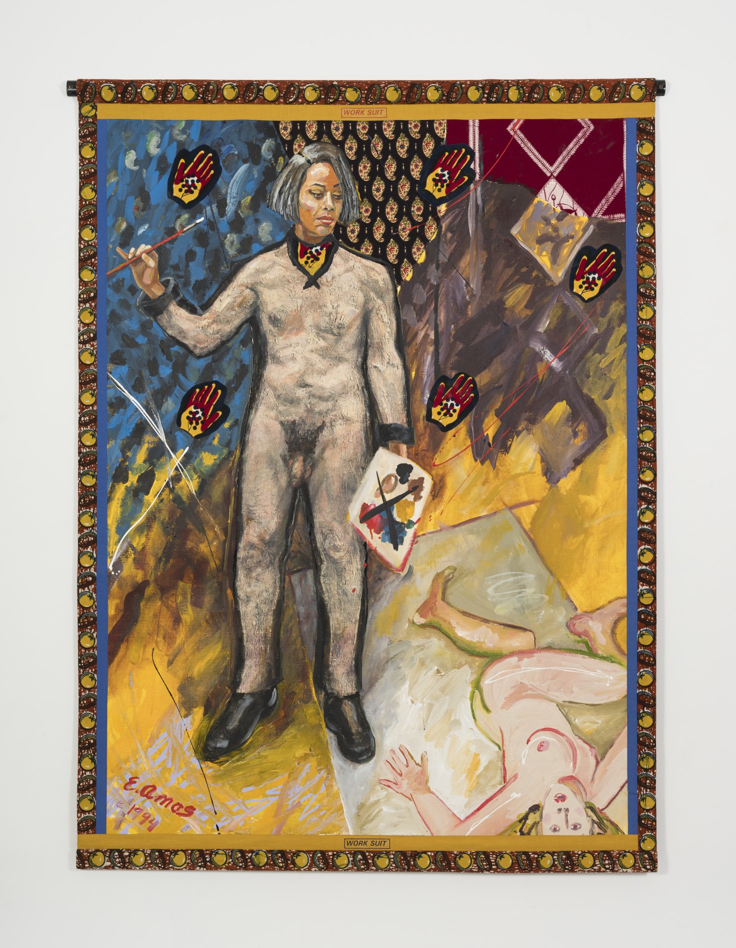 Emma Amos, who is Black, depicts herself wearing a skin-suit of a white person with a penis, while painting a nude white person laying on the ground.